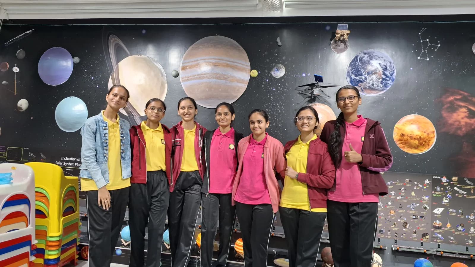 A school group visiting Tanmaye's Amazing Space Museum